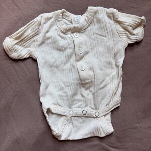 Kate Quinn Cream Ribbed Bodysuit